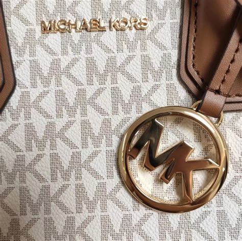 hoe kan ik nep michael kors onderscheiden|michael kors metal logo.